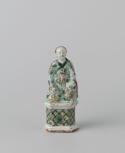 Figure of a seated Chinese