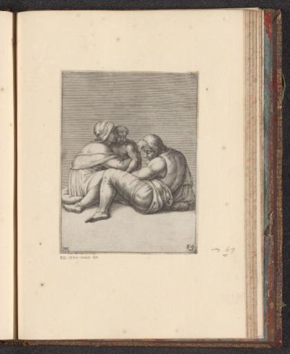 Man Sitting on the Ground with Woman and Child