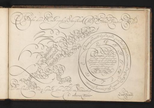 Writing sample with a dragon in scrollwork