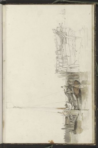 Men on a moored fishing boat at a quay