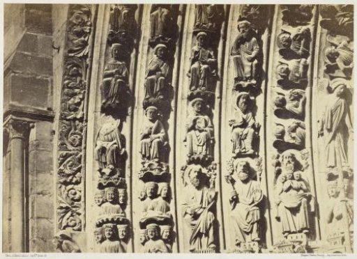 Detail of the relief above the central portal of Notre Dame, Paris