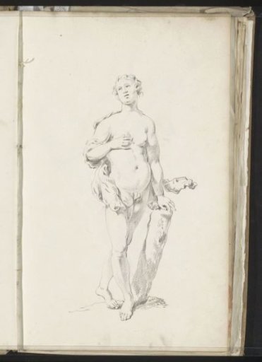 Standing naked woman by a tree trunk