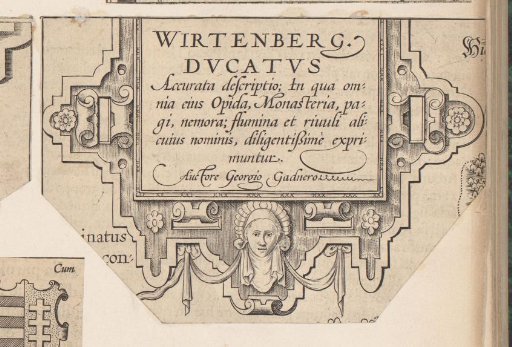 Cartouche with a female mask