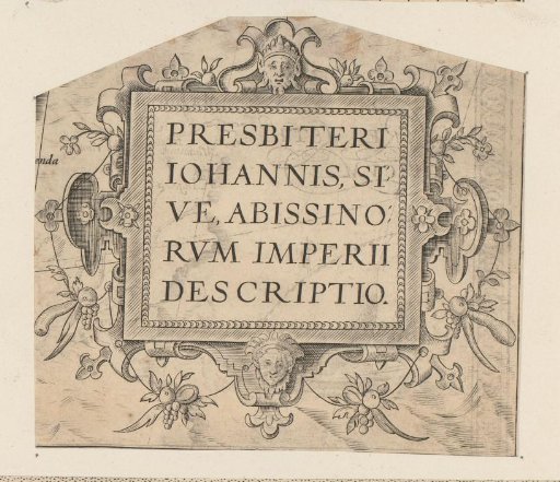 Cartouche with two masks and bunches of fruit
