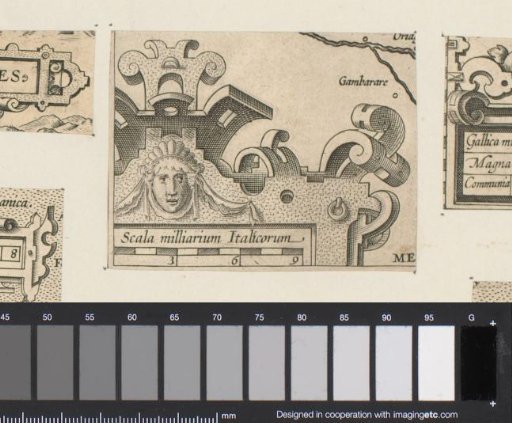Corner cartouche with a mask and a scale