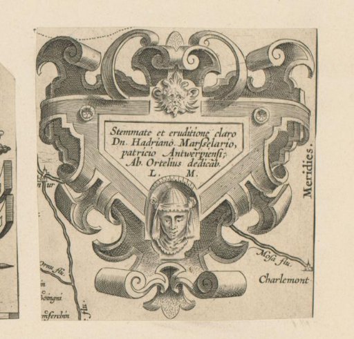 Triangular cartouche with a female mask