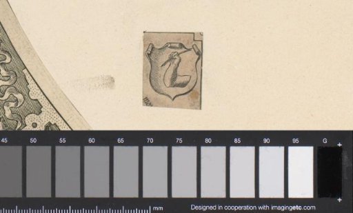 Shield with arm and writing quill