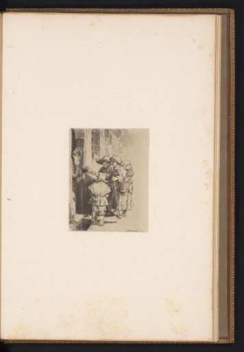 A blind hurdy-gurdy player with his family receives an alms