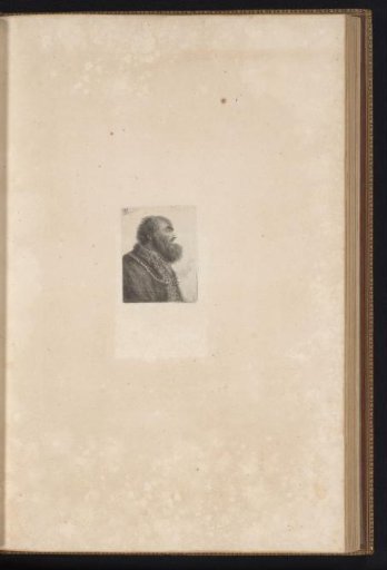 Man with a beard and a chain