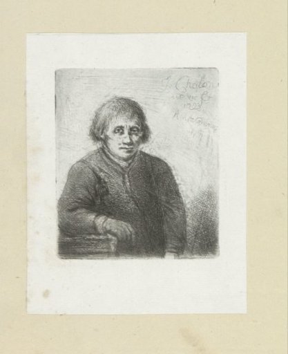 Young man leaning on a table