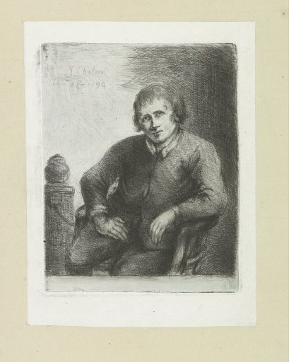 Seated man beside a pillar