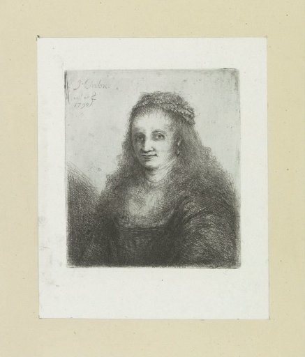 Woman with a pearl necklace in her hair