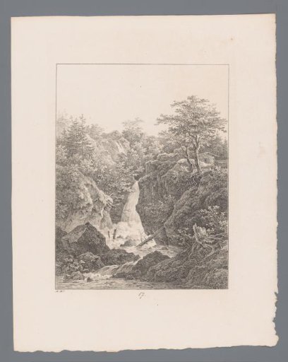 View of a waterfall in a rocky landscape