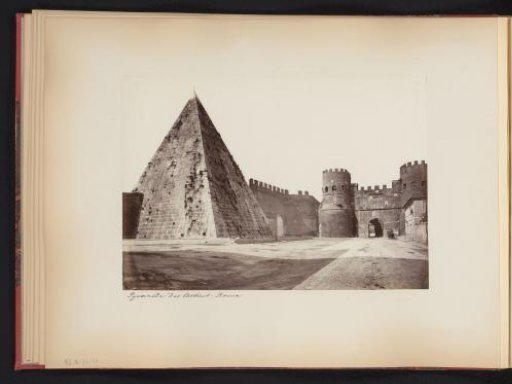View of the Pyramid of Gaius Cestius and Porta Ostiense in Rome, Italy