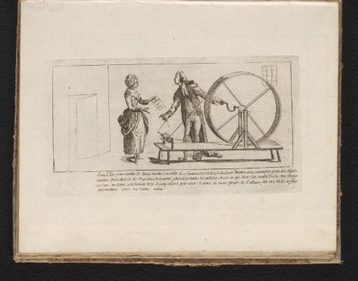 Man and woman at a carding wheel