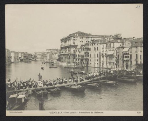 Procession over a pontoon bridge on the Canal Grande in Venice during the Festa del Redentore