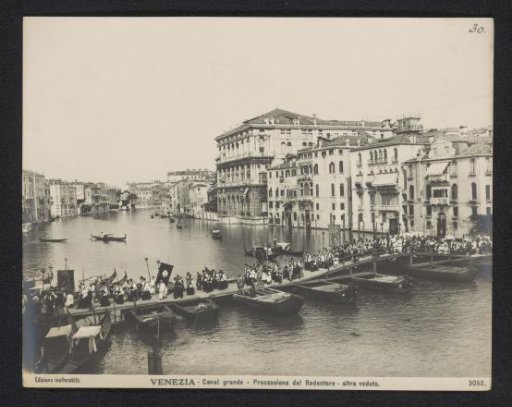 Procession over a pontoon bridge on the Grand Canal in Venice during the Festa della Madonna della Salute
