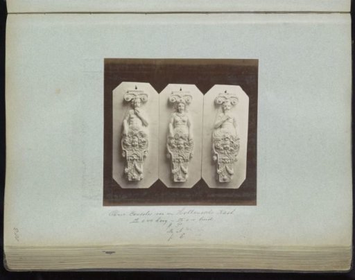 Three plaster casts of consoles from a Dutch cabinet