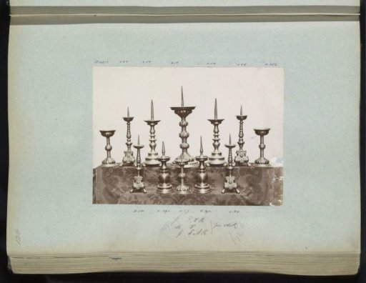 Twelve copper candlesticks