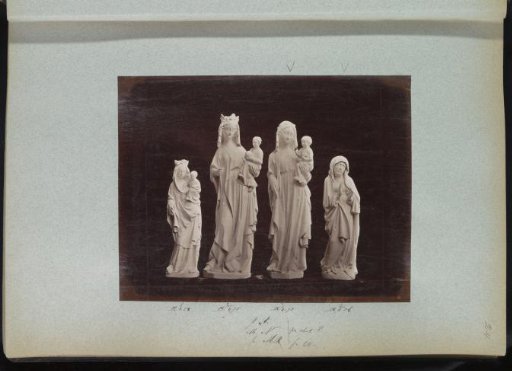 Four plaster casts of sculptures, three of which are of the Virgin and Child
