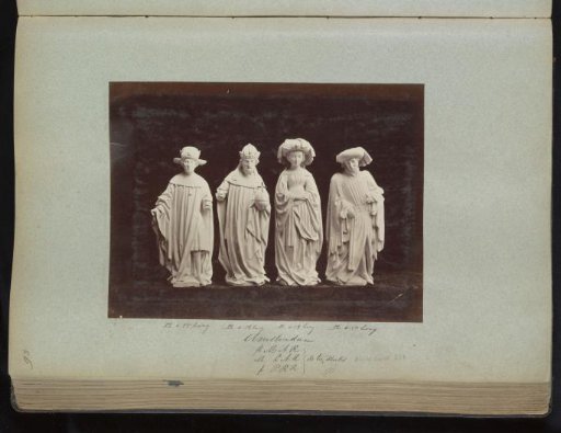 Four plaster casts of human figures