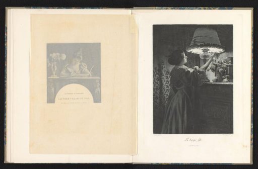 Woman lighting a lamp