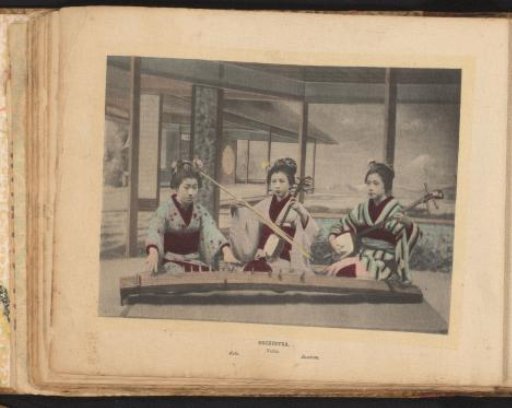 Three unknown women playing music