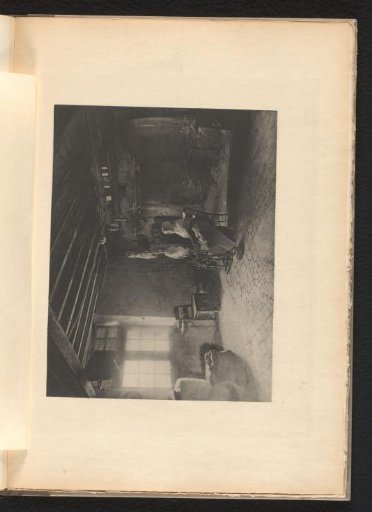 Woman spinning wool in an interior
