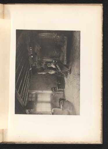 Woman spinning wool in an interior