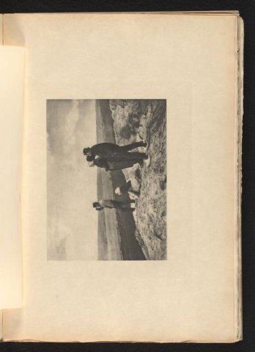 Two men and two women looking at the sea from the dunes near Katwijk