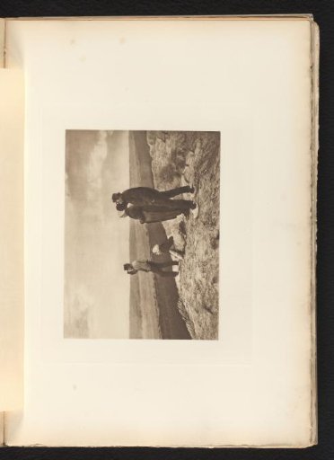 Two men and two women looking at the sea from the dunes near Katwijk