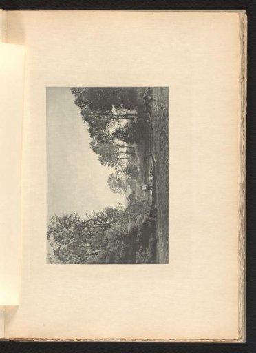 View over a lake with a man in a gondola