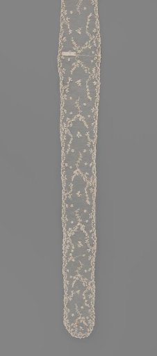 Two sewn-together chin flaps of needle lace