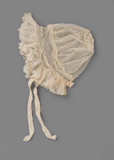 Cap of machine-made tulle decorated with tambour work and appliqué, trimmed with a border of bobbin lace