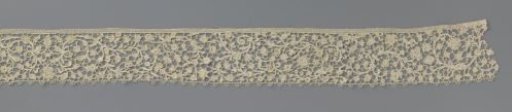 Strip of needle lace with various flowers and leaves