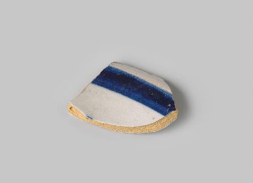 Plate sherd of white-firing earthenware with white glaze on both sides, and a blue stripe on the front