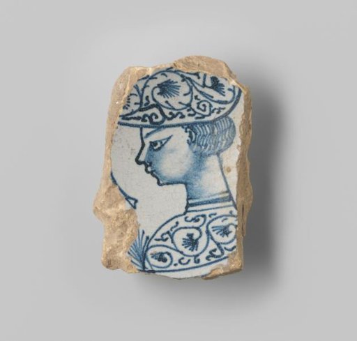 Fragment of a plate with a white-firing sherd, with white glaze on the front and back, featuring a portrait of a man in a cloak in profile painted in blue on the front