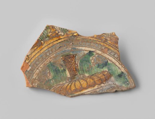 Sherd of red-fired earthenware, decorated on the front with a vase on a foot in a circle, in sgraffito technique with white, yellow, green and blue glaze, unglazed on the back
