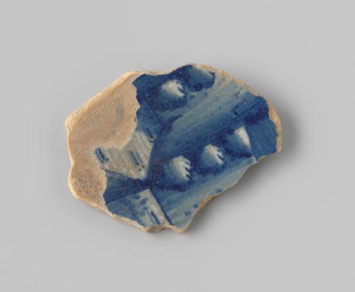 Fragment (foot) with white sherd, in opaque white and clear blue glaze a building