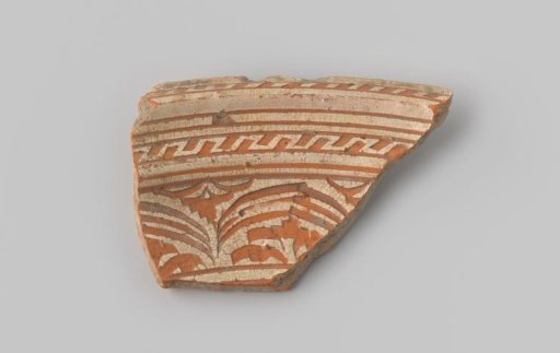 Fragment with a red sherd, decorated on the upper side with striped bands in sgraffito technique with white glaze