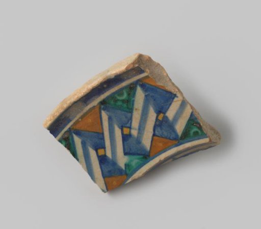 Fragment of grey-fired earthenware, decorated with a geometric pattern in white, blue, green and orange