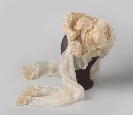 Hat for a girl, of raffia and white muslin decorated with pink roses