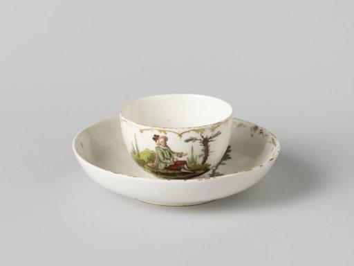 Cup and saucer, polychrome painted with a man in a landscape