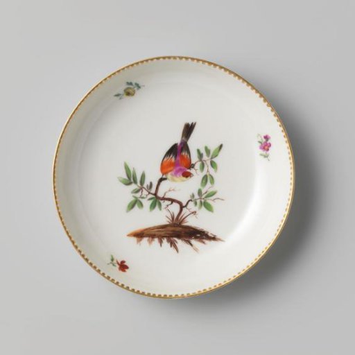 Saucer with a bush, bird, and straw flowers