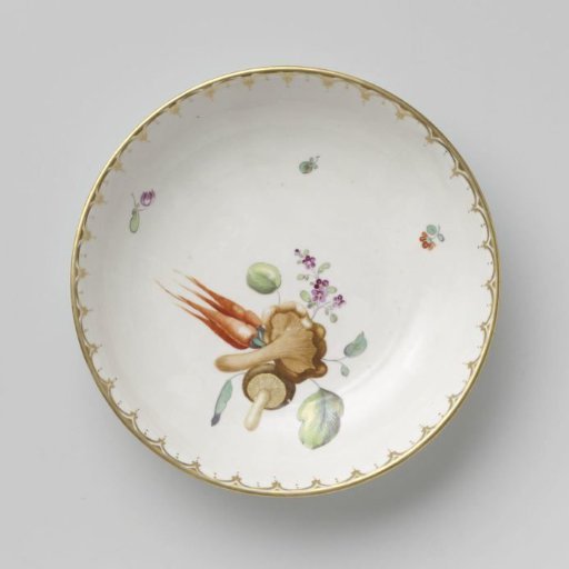 Plate painted with vegetables and fruits surrounded by straw flowers