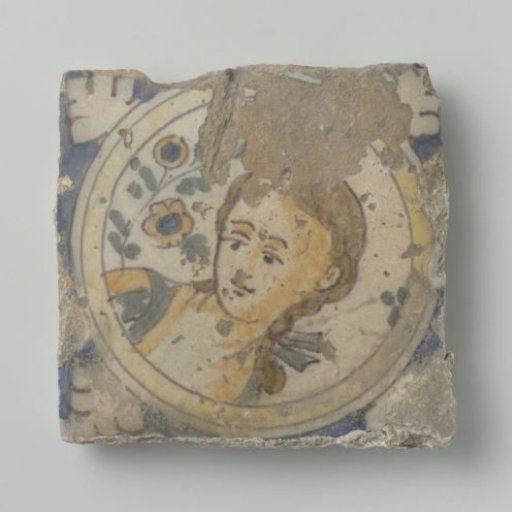 Tile with the head of a woman
