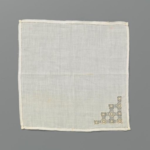 Handkerchief of Irish linen with a triangular ornament in one corner with rosettes and stripes in drawn-thread work