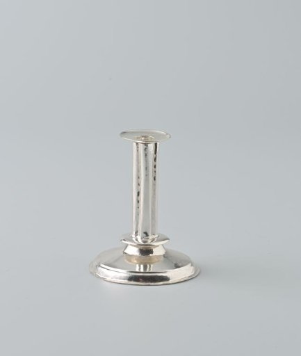 Silver candlestick with grease catcher
