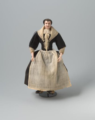 Doll, representing the midwife or nurse