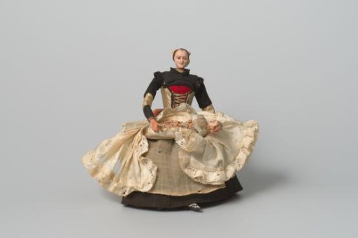 Doll, representing the wet nurse